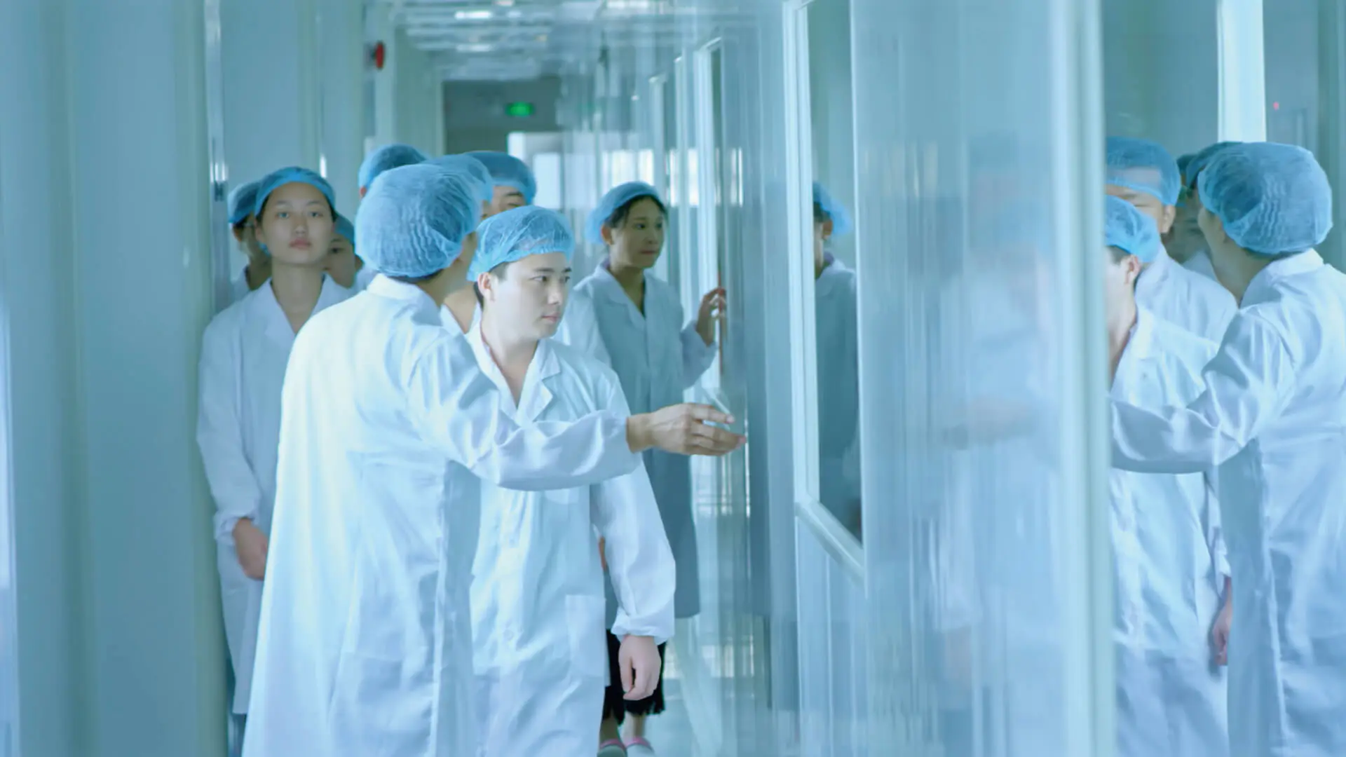 Quality team reviewing controlled cosmetic manufacturing facilities